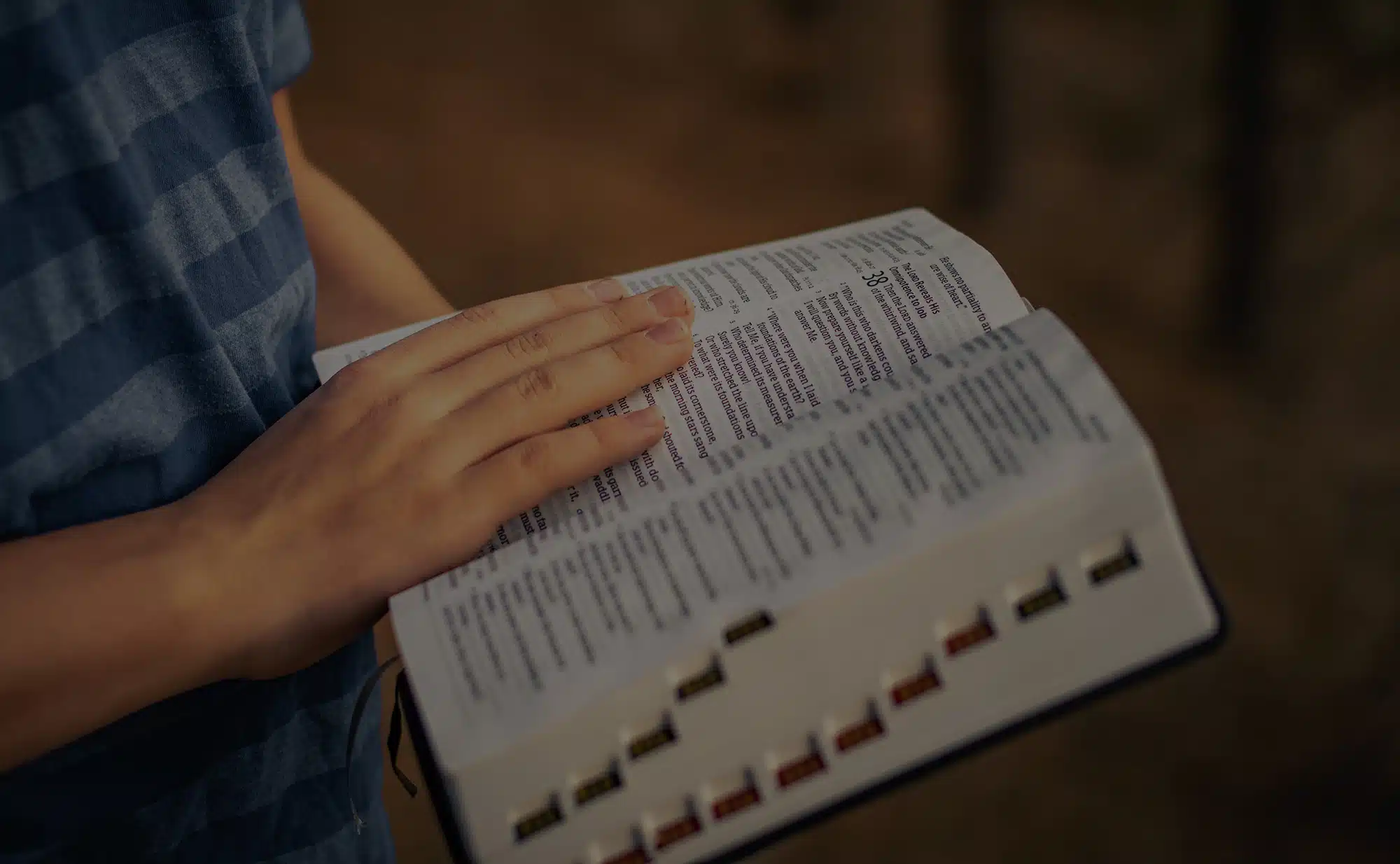 Teen reading the bible